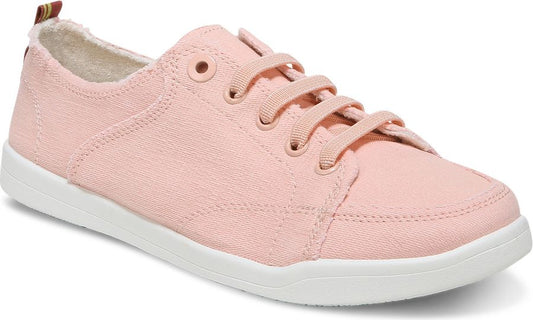 A pink canvas sneaker with white sole and laces.