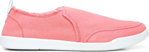 A pink canvas slip-on sneaker with a white sole.