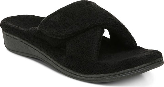Black fuzzy slide sandal with a velcro strap.