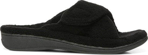 A black slipper with a soft, textured surface and a low, flat sole.