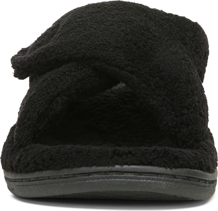 Back view of a black slipper featuring a rounded toe and textured upper.