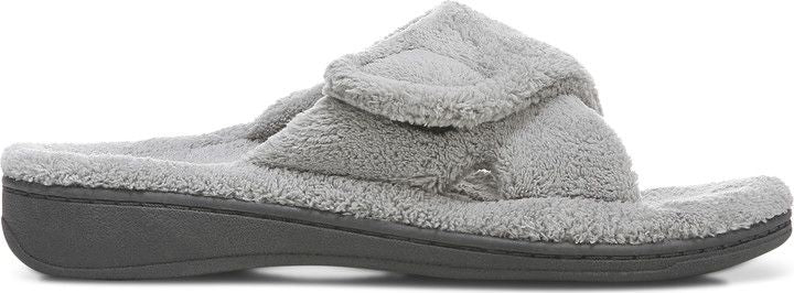 A grey fuzzy slipper.